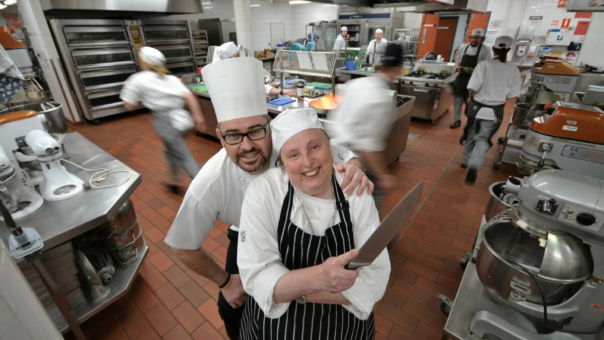 ASPIRATIONS: Despite being vision impaired, Sarah Elliott is chasing her dreams of becoming a chef and thanked TAFE teacher Luke De Ville for his support. Photo: TAFE NSW. 