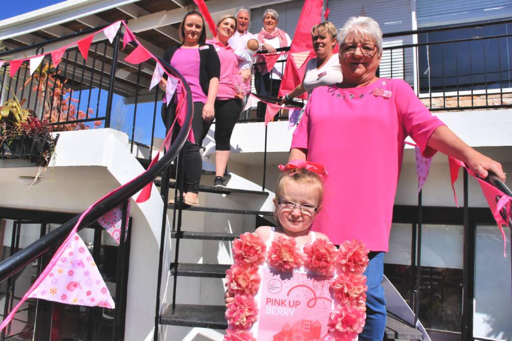 GET OUT YOUR PINK: Molly Smith (front) with the dedicated committee (clockwise) Taleen Smith, Kristy Berry and seven-month-old Laila Berry, David Farthing (owner of Bel-Air), Pauline Windley, Joanne Shield and Deb Woolford. Not pictured: Karen Brooks and Sandra Bramley. 