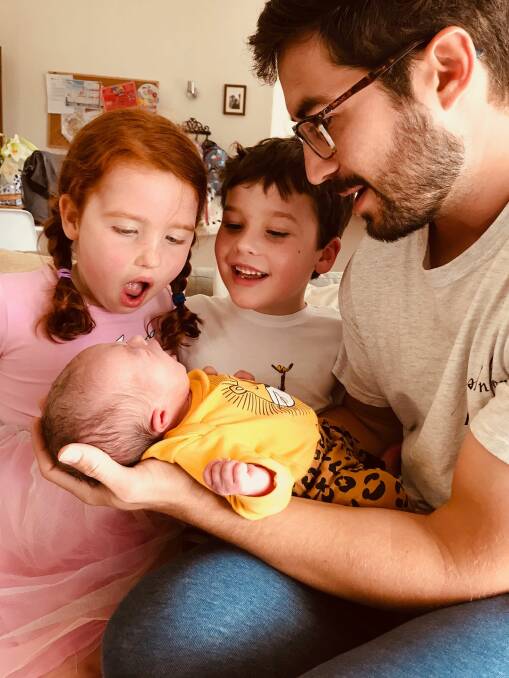 FAMILY: Proud dad Tom Dowden introduces Scarlett and Jack to their new sister Molly on Sunday, December 15. Photo supplied. 
