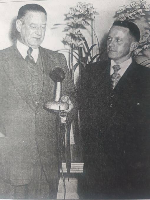 Shoalhaven Shire president Percy 'Pro' West speaking at the opening of the Whit Ensign Club on October 21, 1954. He's pictured with Albert Morison who was chairman of the original board of directors. Photo: Shoalhaven Historical Society. 