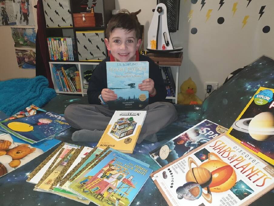 POWER READER: Seven-year-old Tyler McNeill from Nowra Christian School is one of the top five leading fundraisers in this year's MS Readathon. Photo: supplied. 