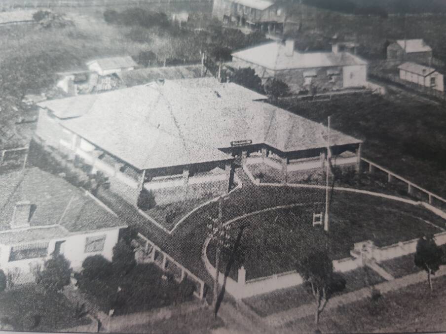 FOR THE NAVY: An aerial view of the White Ensign Club in 1955. Today the Shoalhaven City Council chambers stand on the land behind. Photograph: Albert Morison via Shoalhaven Historical Society. 