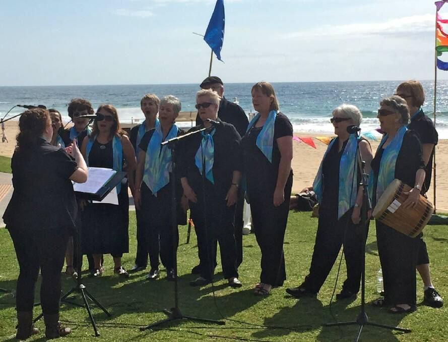 JOIN IN: Members of Raised Voices choir singing at a 'Choir-tly Loud' event venue at Wollongong. Photo: contributed. 