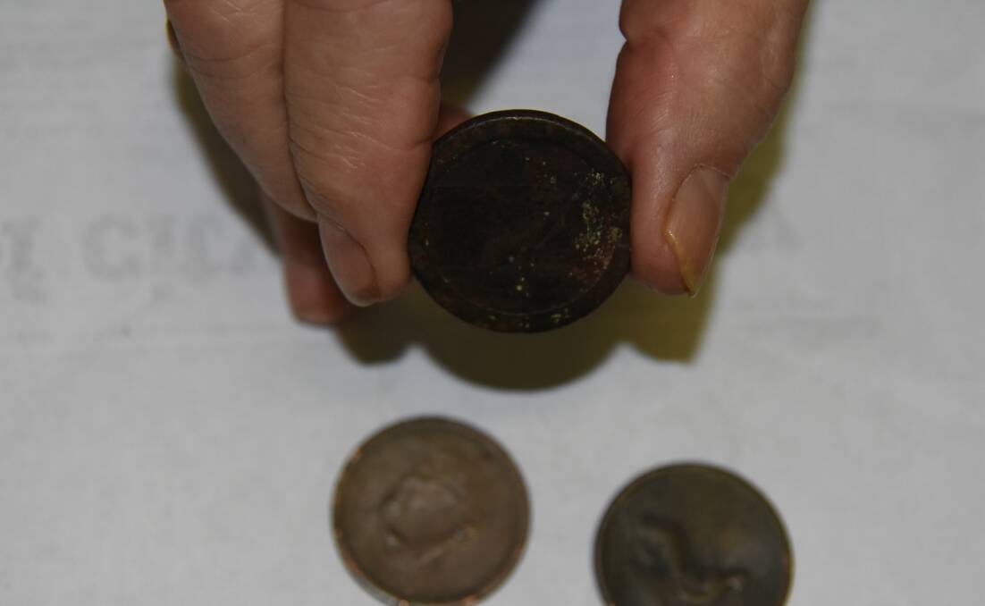 RARE: A coin from 1737 (in hand) and two from the early 1800s make up a local man's valuable coin collection. 
