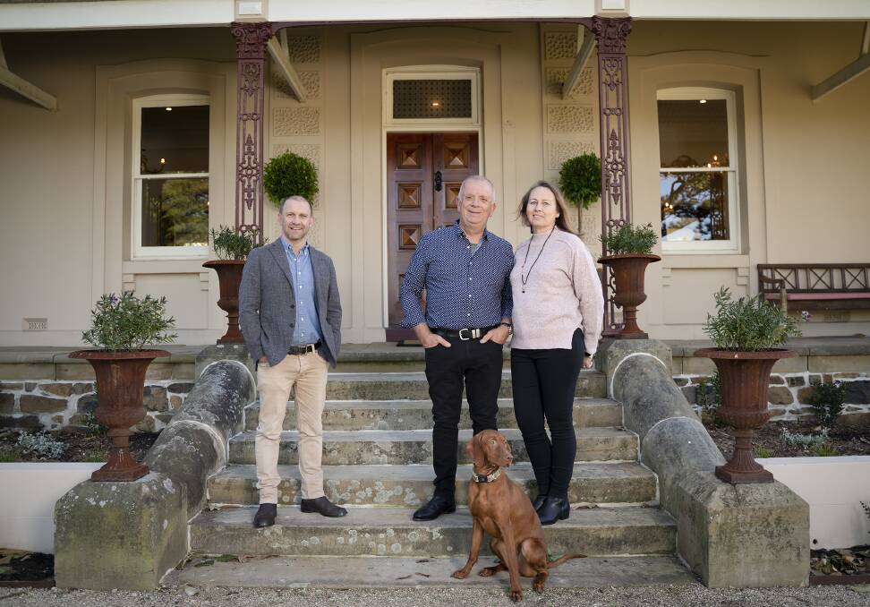 Restoration Australia presenter Anthony Burke with Scott and Kate Lucas. Picture: Supplied