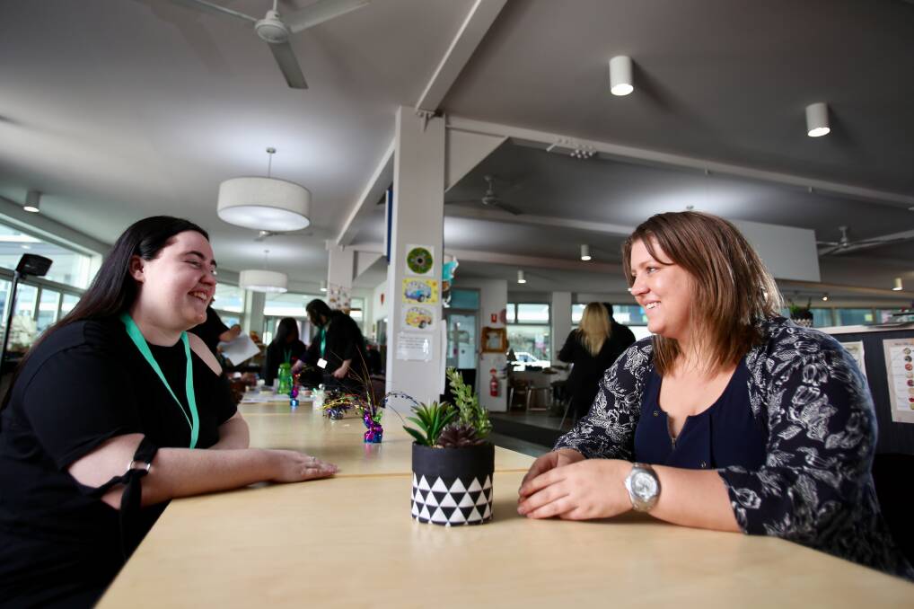 Erin Plunkett (left) and Caitlin Kozman at Friday's 'Living Libraries' event in Wollongong. Picture: Adam McLean 