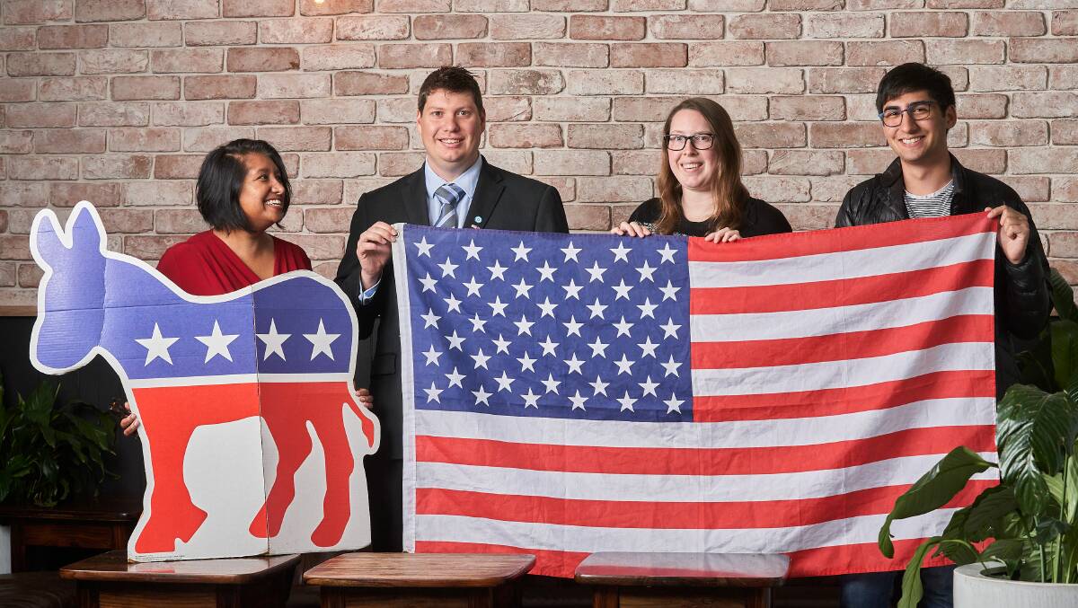Democrats Abroad, Ritu Clementi, ACT Chair, Justin Underwood, Laura Eash, and Nikhil Clementi, ahead of the US election. Picture: Matt Loxton