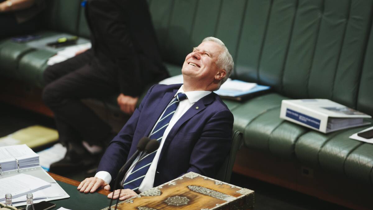 Michael McCormack sits in the PM's chair during questions times hours after being dumped as National party leader. Picture: Dion Georgopoulos