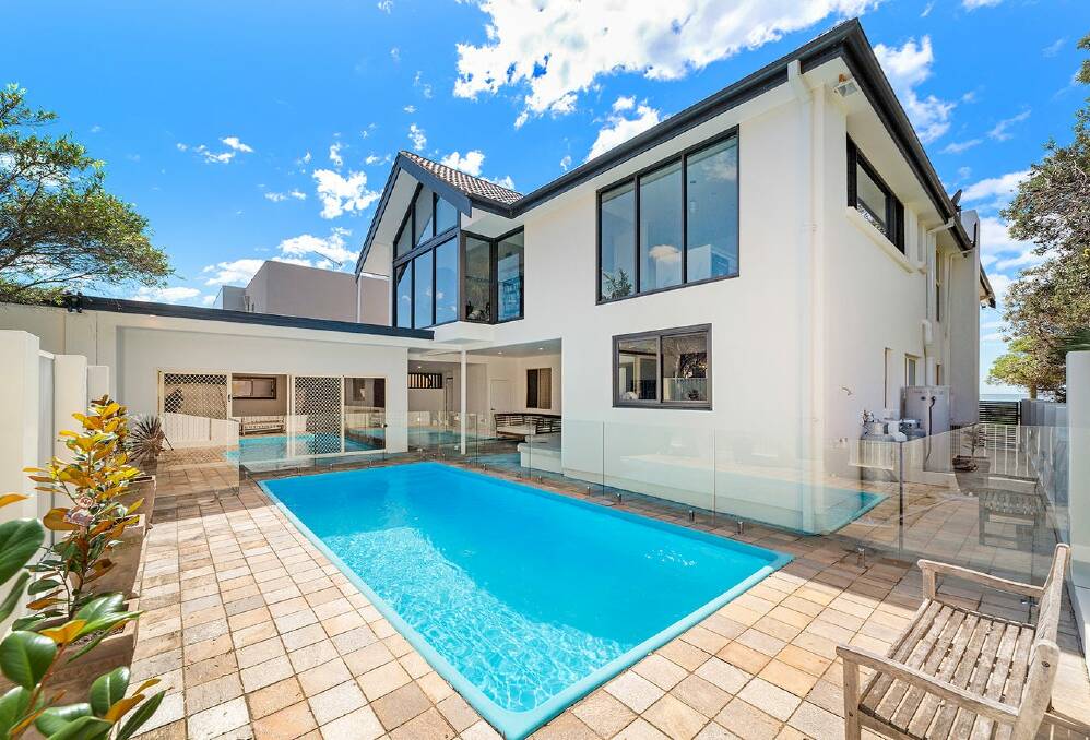 Former UOW boss lists beachfront Woonona home for $3.9 million plus