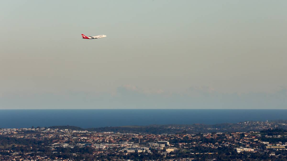 The last Qantas Boeing 747-400 during its farewell flight over the Illawarra in July. Picture: Adam McLean
