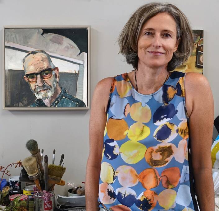 RETURNING THE FAVOUR: Local South Coast artist Alison Mackay with her entry in the Archibald Prize, Quid Pro Quo, a portrait of photographer, Gary Grealy.