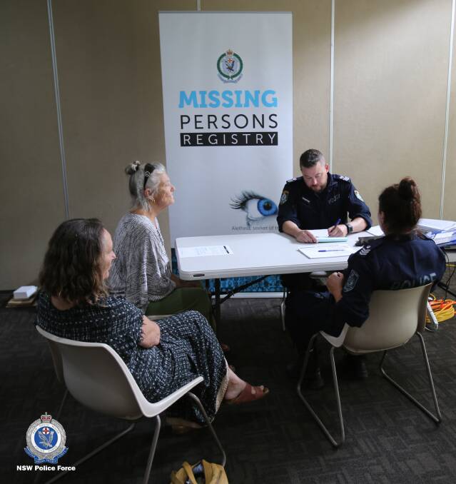 Search for answers: A pop-up familial DNA collection centre is kept busy. Photo: NSW Police