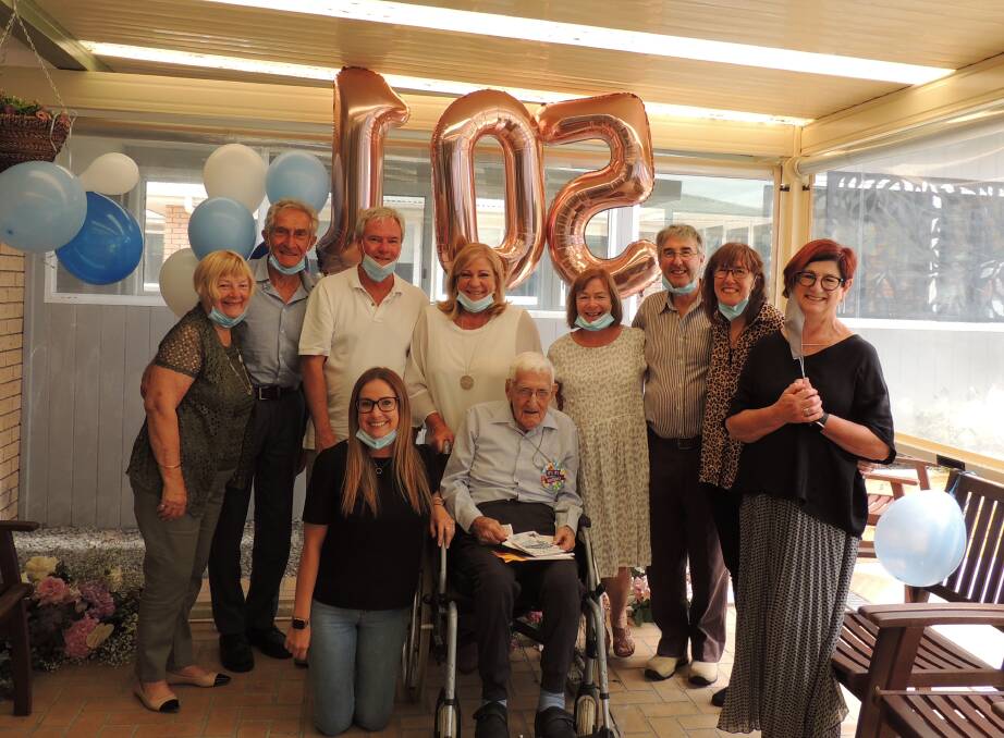 CELEBRATE: Fred Power, centre, celebrates his 105th birthday at Inasmuch, surrounded by friends and family. Image supplied.