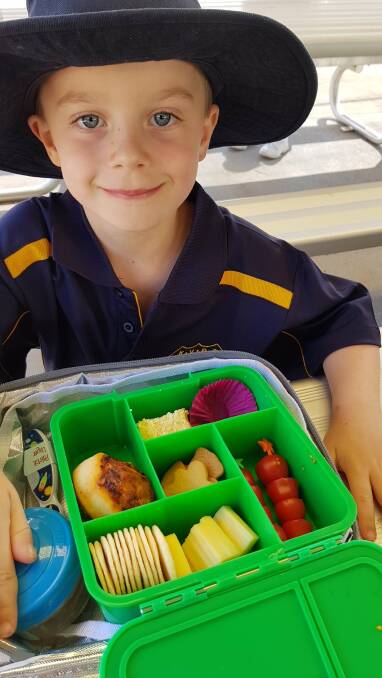 A proud Kangaroo Valley student with his plastic-free lunch box.