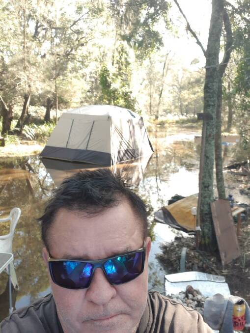 Mr Pender at his flooded camp site.