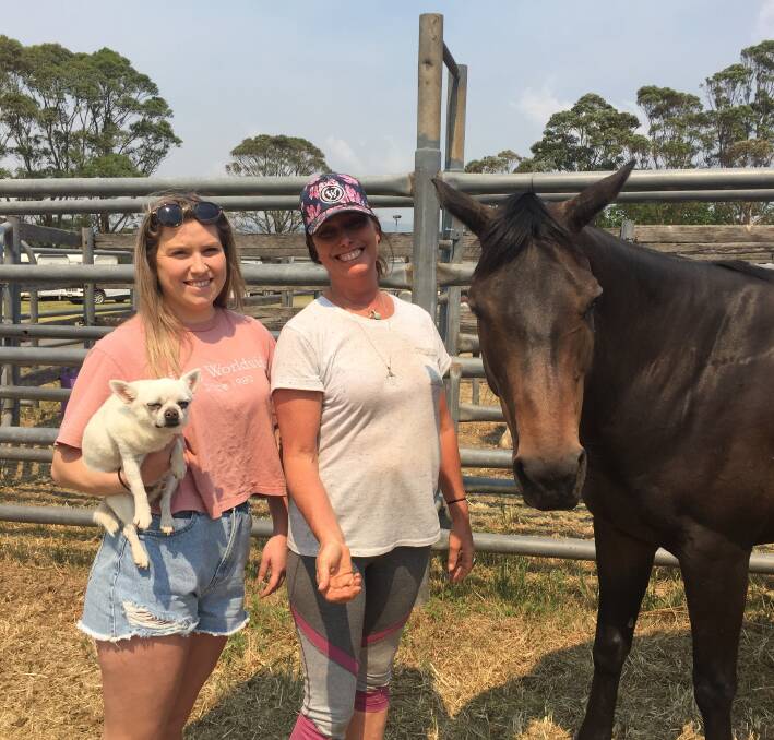 Brooke Raffell and Karen Spencer with dog, Chopper and horse, Ebony at the Milton Showground.