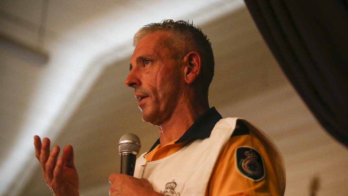 LONG SEASON: Mark Williams addresses a town hall meeting in Kangaroo Valley.