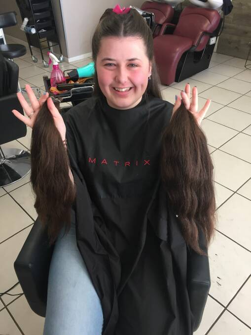 Elizabeth celebrates life with the big chop, and helps sick kids