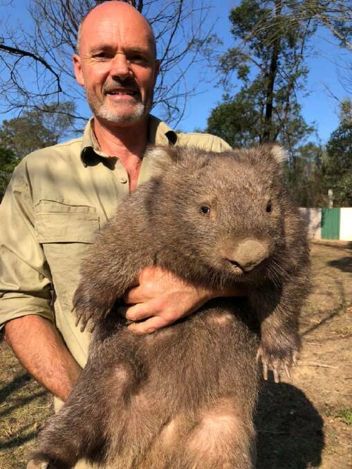 Phil Donovan with a rescued wombat.