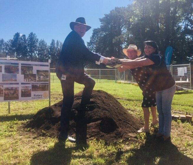 DIG IN: Kiama MP Gareth Ward, Shoalhaven Mayor Amanda Findley and Berry Rotary Club president Haseena Tweddle turn the first sod on the Rotary Nature Play Park at Boongaree, Berry.