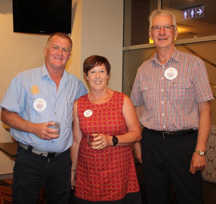 Rotary Nowra President, Graeme Cord, thanks and makes a small presentation to Bruce and Peita Whiley for their most interesting "Behind the Badge" talk.