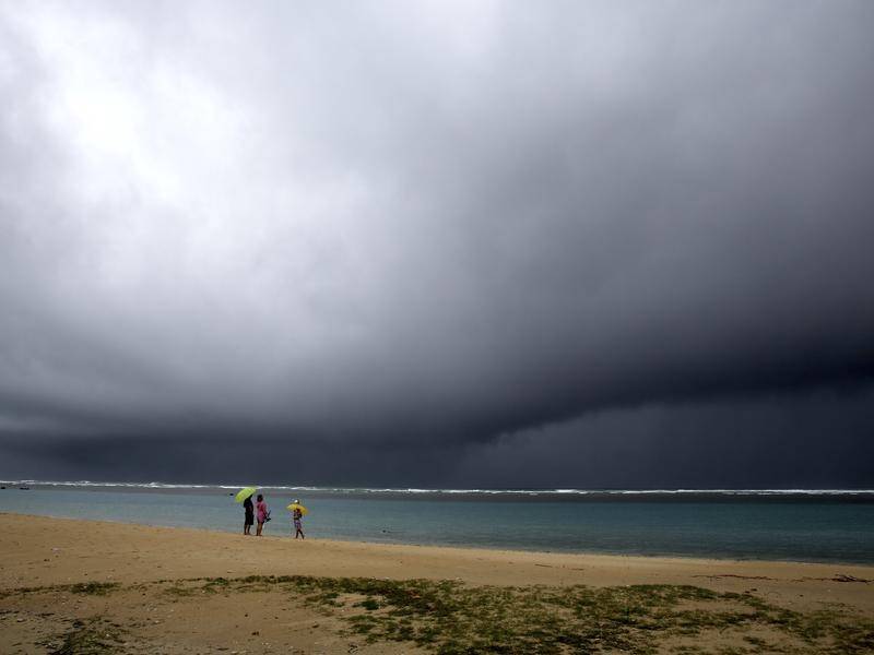 Hawaii residents have been told to prepare as high winds and heavy rain lash the archipelago.