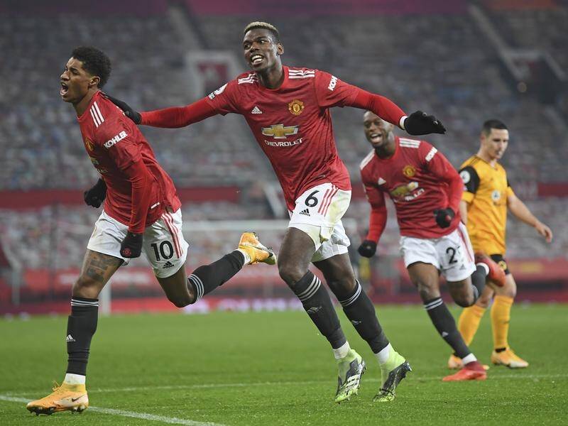 Marcus Rashford's (l) late winner against Wolves moved Manchester United up to second in the EPL.