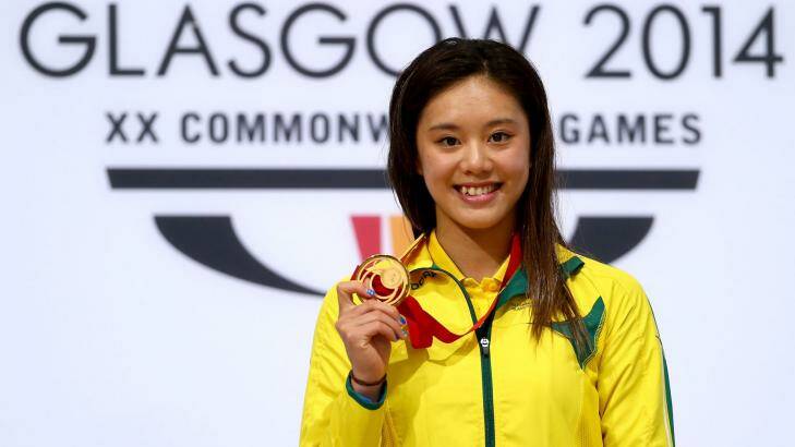 Esther Qin of Australia with her gold medal after winning the 3 metre springboard final at the Royal Commonwealth Pool at the  Commonwealth Games. Photo: Clive Rose