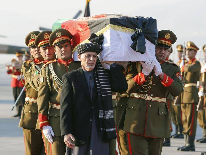 Afghan President Ashraf Ghani (C) joined in a memorial for slain Japanese physician Tetsu Nakamura.