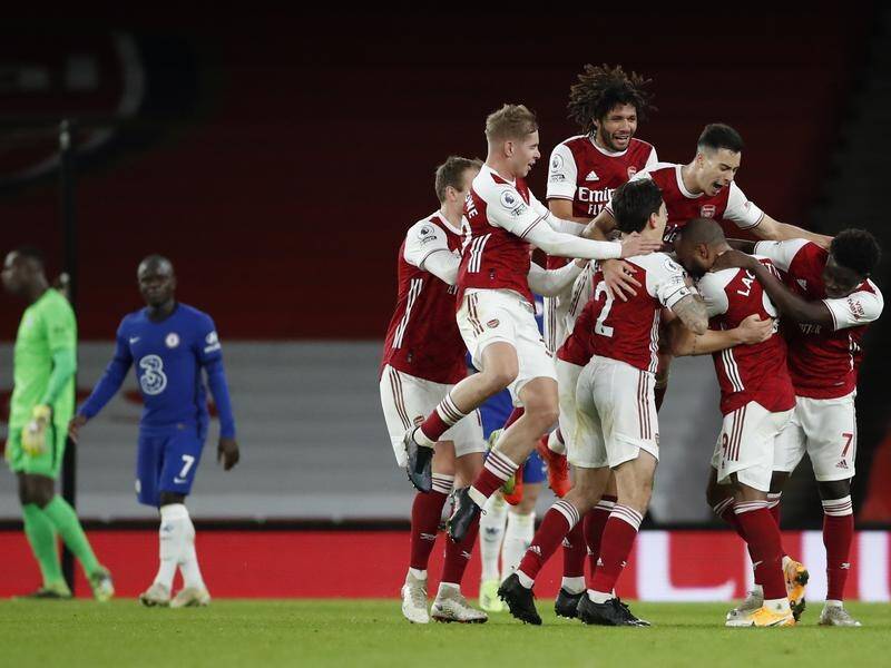 Arsenal celebrates Granit Xhaka's goal in their Premier League win over Chelsea.