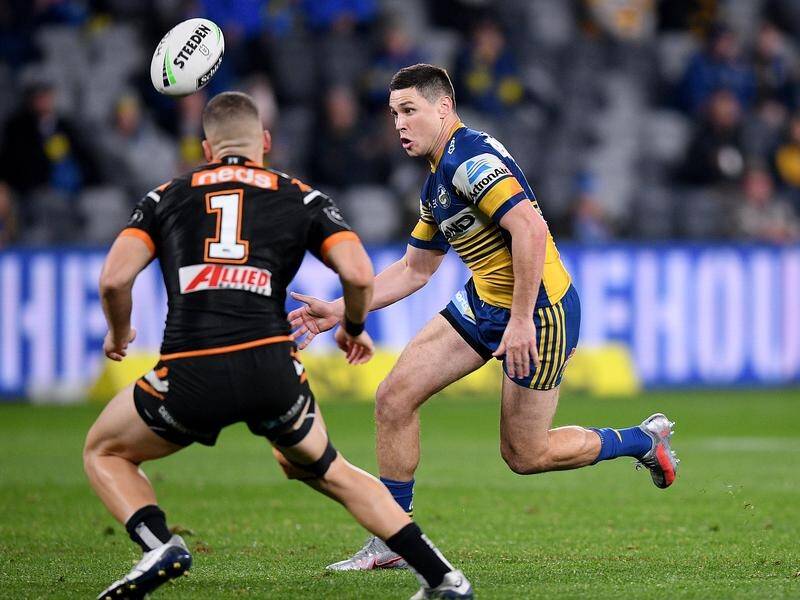 Mitchell Moses produces a flash of inspiration to score in the Eels' 26-16 NRL win over the Tigers.