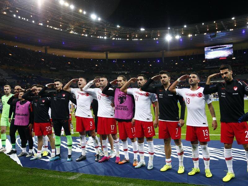 Turkey player salute the crowd after their Euro 2020 draw with France.