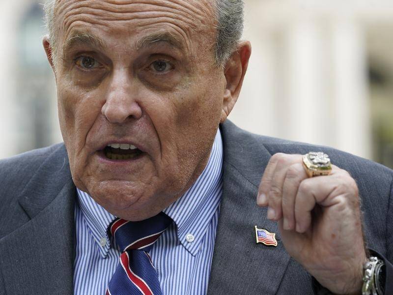 Donald Trump's former lawyer Rudy Giuliani is vehemently denying the latest charges against him. (AP PHOTO)