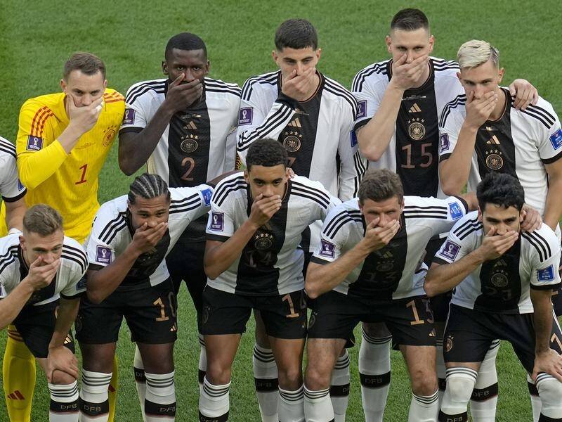 Germany staged an on-pitch protest over the 'One Love' armband before their match with Japan. (AP PHOTO)