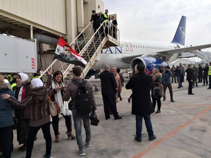 A Syrian commercial flight from Damascus has landed at Aleppo airport for the first time since 2012.