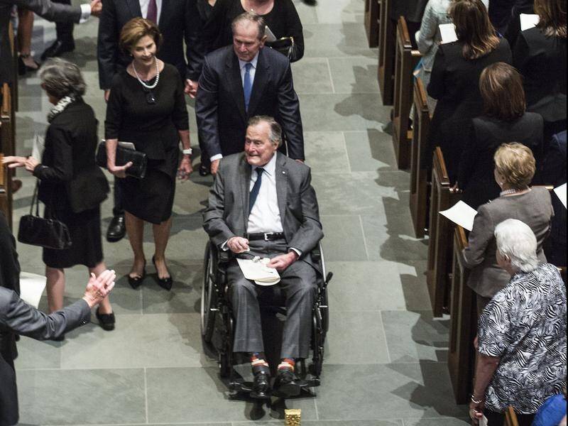 Former US president George Bush has been admitted to hospital a day after his wife's funeral.
