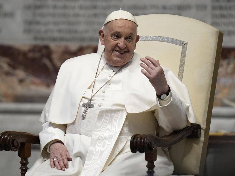 Pope Francis describes the notion of retiring as "distant hypothesis" in a new book on the pontiff. (AP PHOTO)