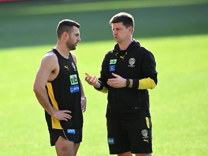 Jack Graham (l) has turned down an offer from Port Adelaide and will remain at Richmond. (Darren England/AAP PHOTOS)
