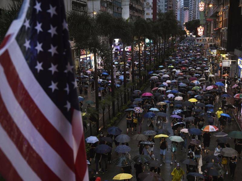 Beijing has told the US through an editorial it cannot influence its decisions on Hong Kong.