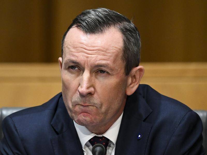 Premier Mark McGowan says it's the right time for WA to move to "much lesser" pandemic powers. (Lukas Coch/AAP PHOTOS)