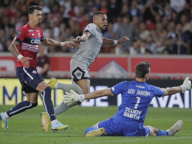 Kylian Mbappe (c) scored a hat-trick in PSG's big win over Lille. (AP PHOTO)