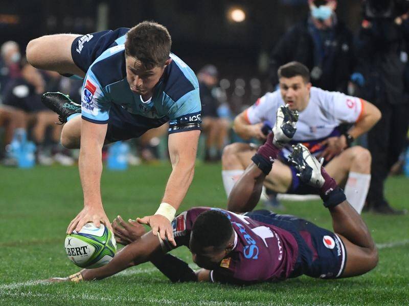 Alex Newsome scores a try for the Waratahs in their 45-12 Super Rugby AU win over the Reds.