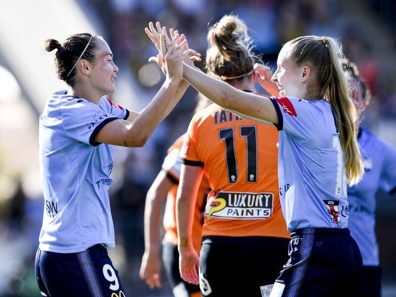 Caitlin Foord (L) has bagged three goals in Sydney FC's 5-1 W-League thumping of Brisbane.