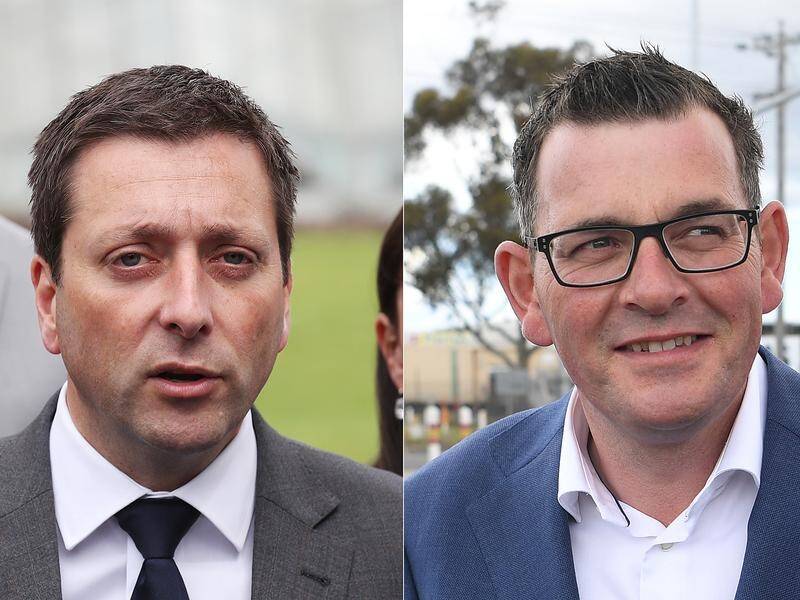 The fate of Matthew Guy (left) and Daniel Andrews could be determined by ten seats. (David Crosling and Julian Smith/AAP PHOTOS)