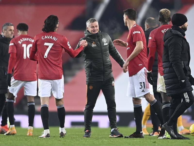 Manchester United manager Ole Gunnar Solskjaer celebrates his side's dramatic late win over Wolves.
