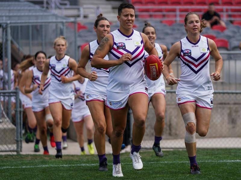 The in-form Dockers will be tested when the come up against the Demons in the AFLW next weekend.