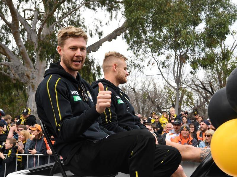 Fans packed central Melbourne to catch a glimpse of their AFL heroes ahead of the premiership clash.