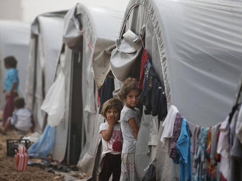 Aid groups are worried about the safety of an Australian born in a Syrian refugee camp.
