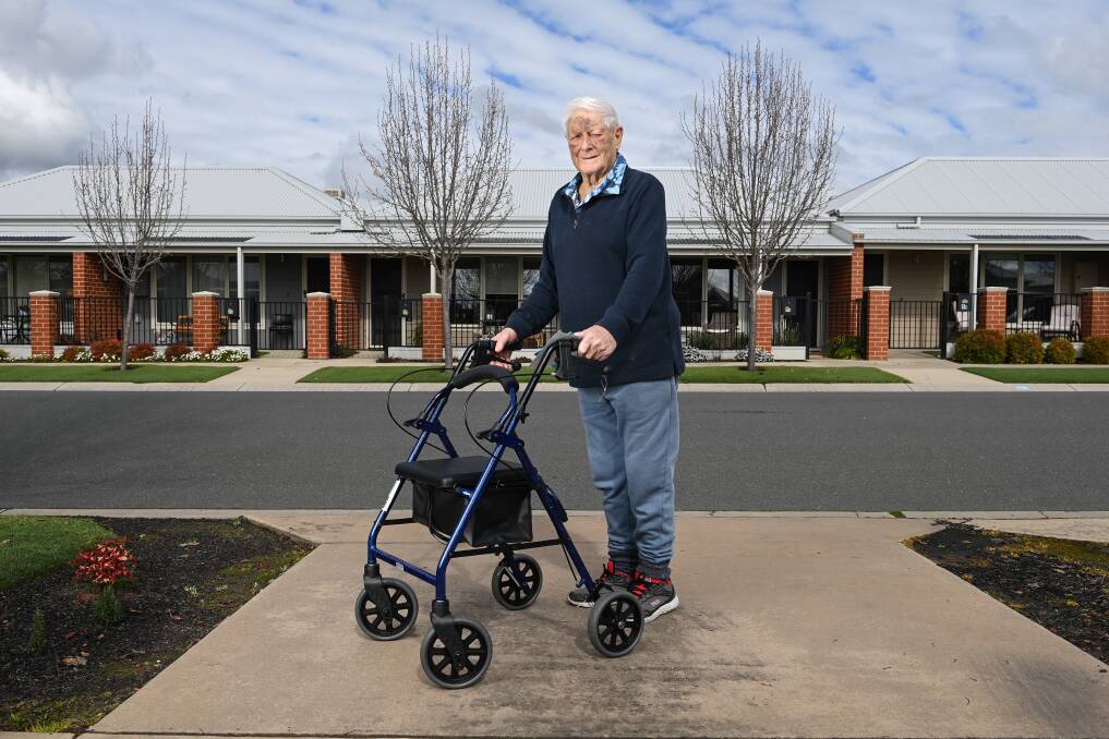 Charlie Caldwell with his new wheeled walker which is helping him get around after his fall. Picture: MARK JESSER