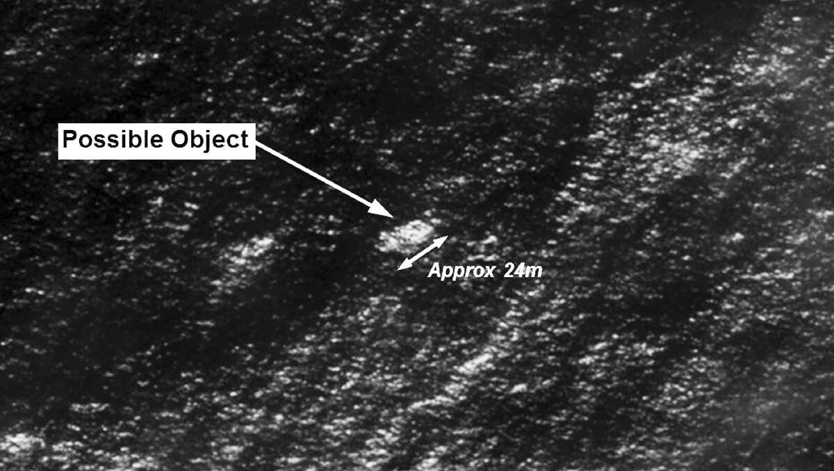 Satellite imagery provided to Australian Maritime Safety Authority (AMSA) of objects that may be possible debris of the missing Malaysia Airlines Flight MH370 in a revised area 185 km (115 miles) to the south east of the original search area in this picture released by AMSA March 20, 2014. Photo: Supplied.